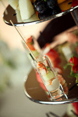 Glasses with seafood snacks - banquet dish