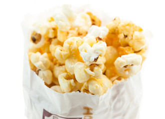 Popcorn in bag on white background