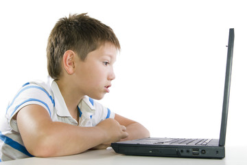 child working on laptop