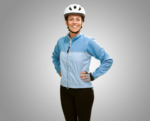 Women smiling with hands on hip