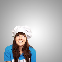 portrait of a female chef looking up