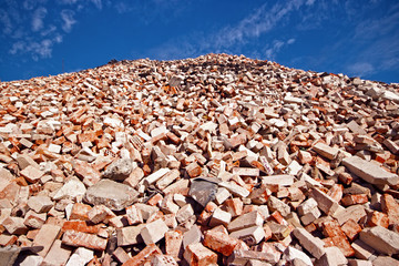 Pile of bricks in demolition waste recycling site