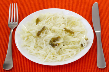 cabbage salad with pepper on the plate