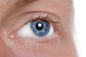 The human eye is blue, close-up