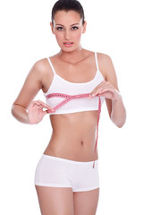 Fit woman with measure tape