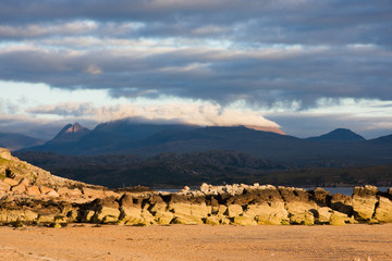 Rocks on shore in last evening light