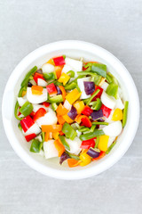 Fresh Bowl of Bell Peppers and Onions
