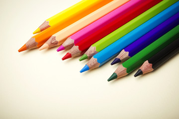 Color pencils crayons on paper background