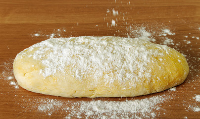 Raw bread on the table.