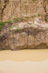 The erosion of soil 