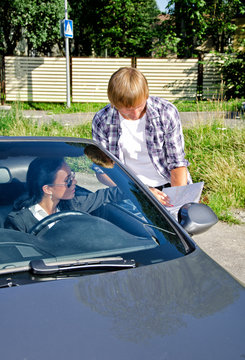 Male Tourist Asking Female Driver About Direction