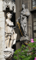 Fototapeta na wymiar Realistic gothic statues decorating facades