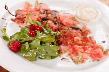 Prosciutto ham with salad