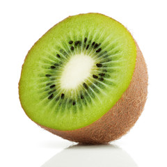 Half of juicy kiwi fruit on white