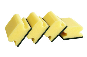 Several yellow sponges for kitchen isolated on white