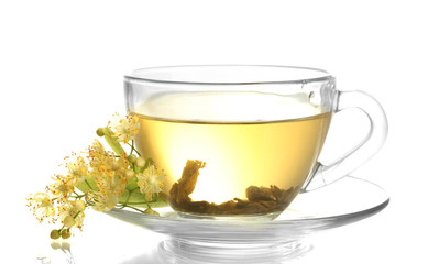 cup of linden tea and flowers isolated on white