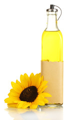 oil in bottle and sunflower, isolated on white