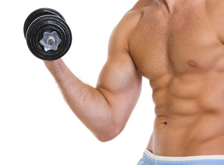 Fototapeta na wymiar Closeup on muscular man workout biceps with dumbbell