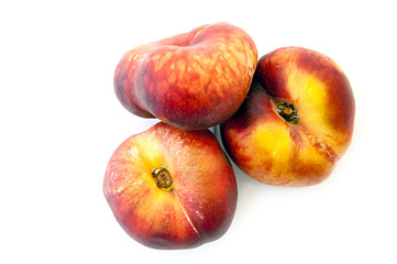 flat peaches on white background