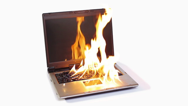 Burning notebook with big red flame