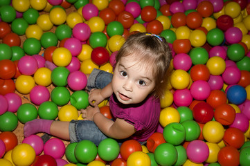 Fototapeta na wymiar girl with colorful balls
