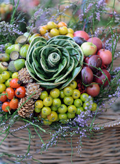 Beautiful bouquet from flowers, fruit and berries
