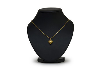 beautiful golden necklace on mannequin isolated on white