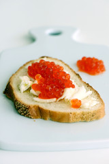 Red caviar with bread and butter