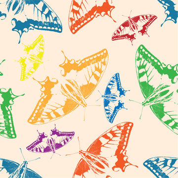Seamless background of colorful butterflies.