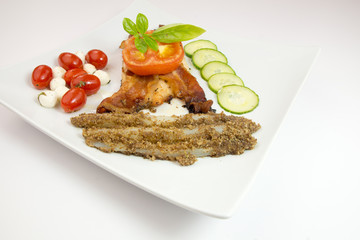 Grilled chicken with bacon, tomato and thyme on white