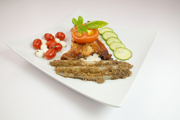 Grilled chicken with bacon, tomato and thyme on white