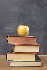 Stack of Books with Apple