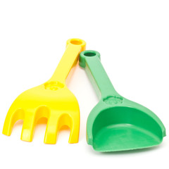 Garden toy tools on white