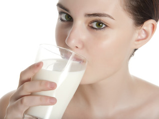 young woman drinking milk