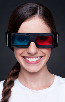 smiley woman watching 3d film