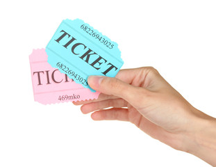 Woman's hand holding a colorful tickets
