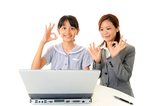 Student On Pc Uniform Teacher Images Browse 231 Stock Photos Vectors And Video Adobe Stock
