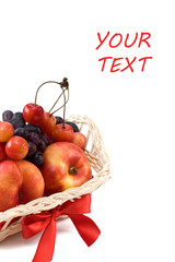 peaches, grapes and cherries in a basket