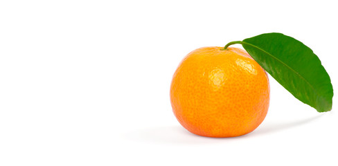 Tangerine with green leaves isolated on white