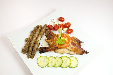 Grilled chicken with bacon ang vegetable
