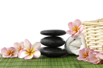 Fototapeta na wymiar Set of frangipani and zen stones and towel