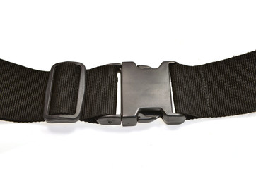 black plastic buckle on strap isolated on white