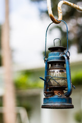 Old-fashioned blue kerosene oil lantern