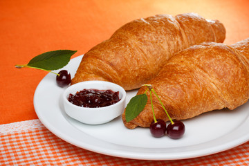 Croissant with cherry jam