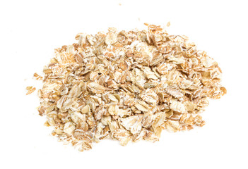 Heap of dry rolled oats isolated on white background