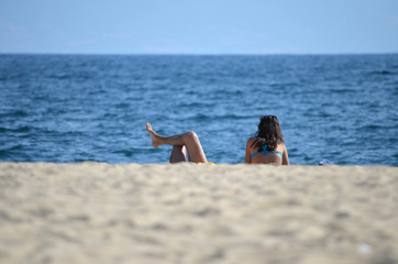 man and woman on the beach