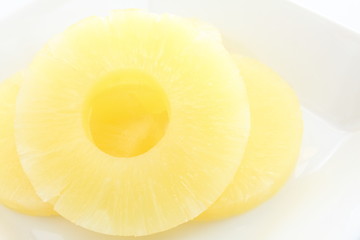 slices of pineapple for dessert image