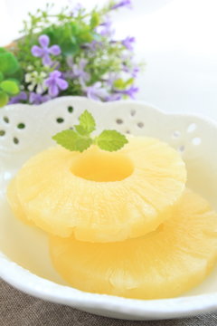slices of pineapple for dessert image