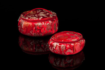 Jewellery boxes against black background