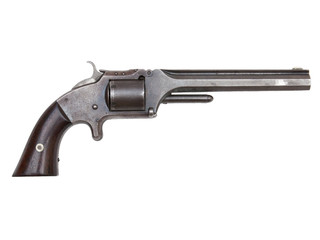 An antique revolver isolated on white